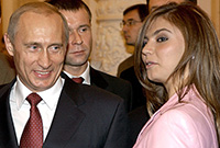 Russian President Vladimir smiles as looks at the Russian gymnast Kabayeva during the meeting with ...